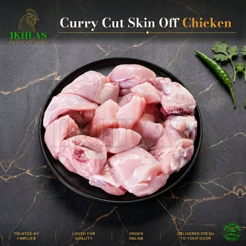 Raw halal chicken curry cut on a white background, photographed for a butcher website