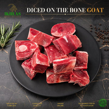 Raw halal diced goat on a white background, photographed for a butcher website