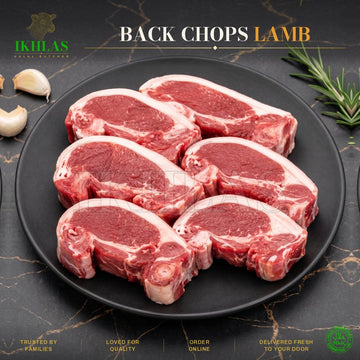Raw halal lamb back chops on a white background, photographed for a butcher website