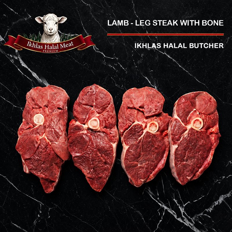 Raw halal lamb leg steak on a white background, photographed for a butcher website