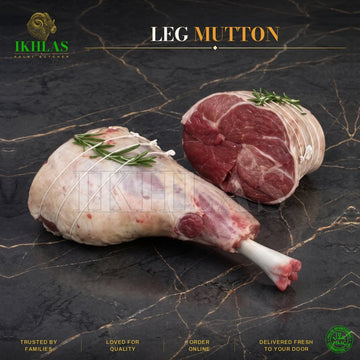 Raw halal mutton leg on a white background, photographed for a butcher website