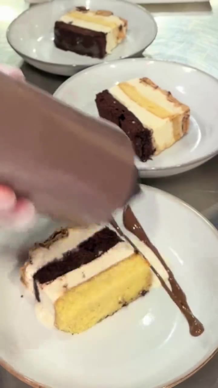 Chocolate-dipped dessert slices, a still from a dessert product loop film