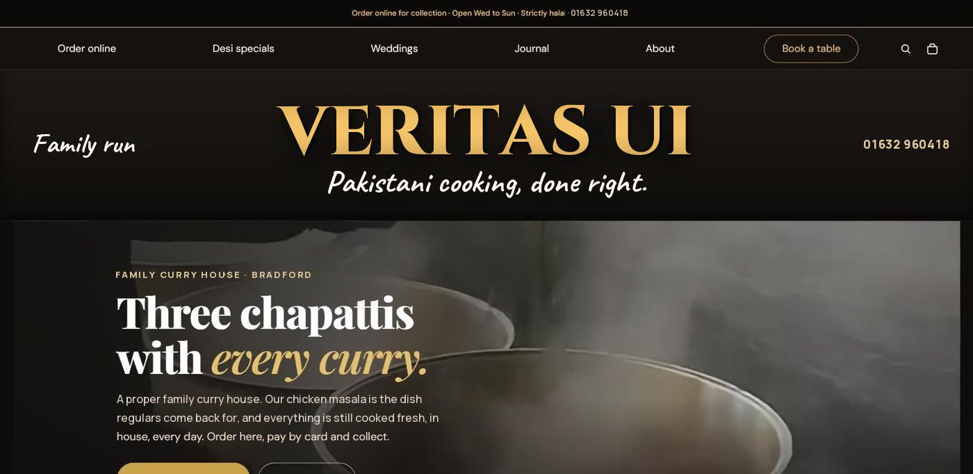 Black and gold restaurant template website, homepage on a laptop